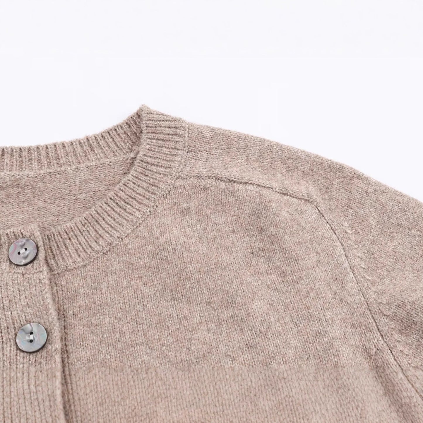 Button decoration round neck long sleeved knitted cardigan jacket for women