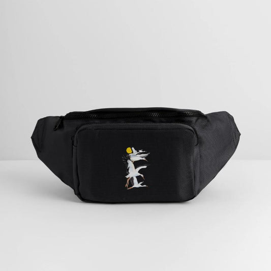 A Flock of White Storks Flying over the Sun