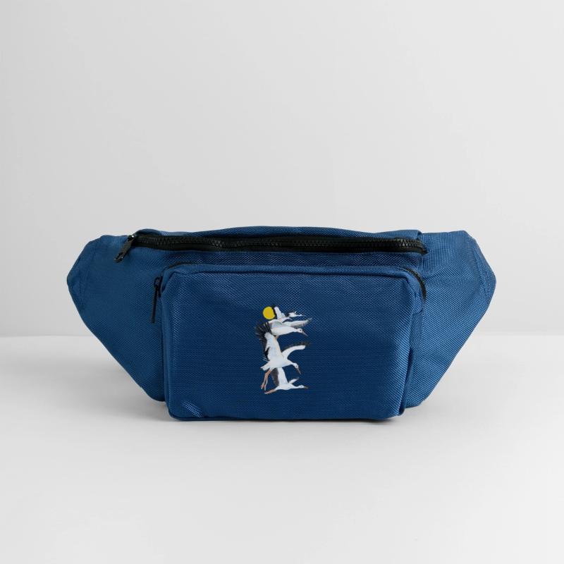 A Flock of White Storks Flying over the Sun